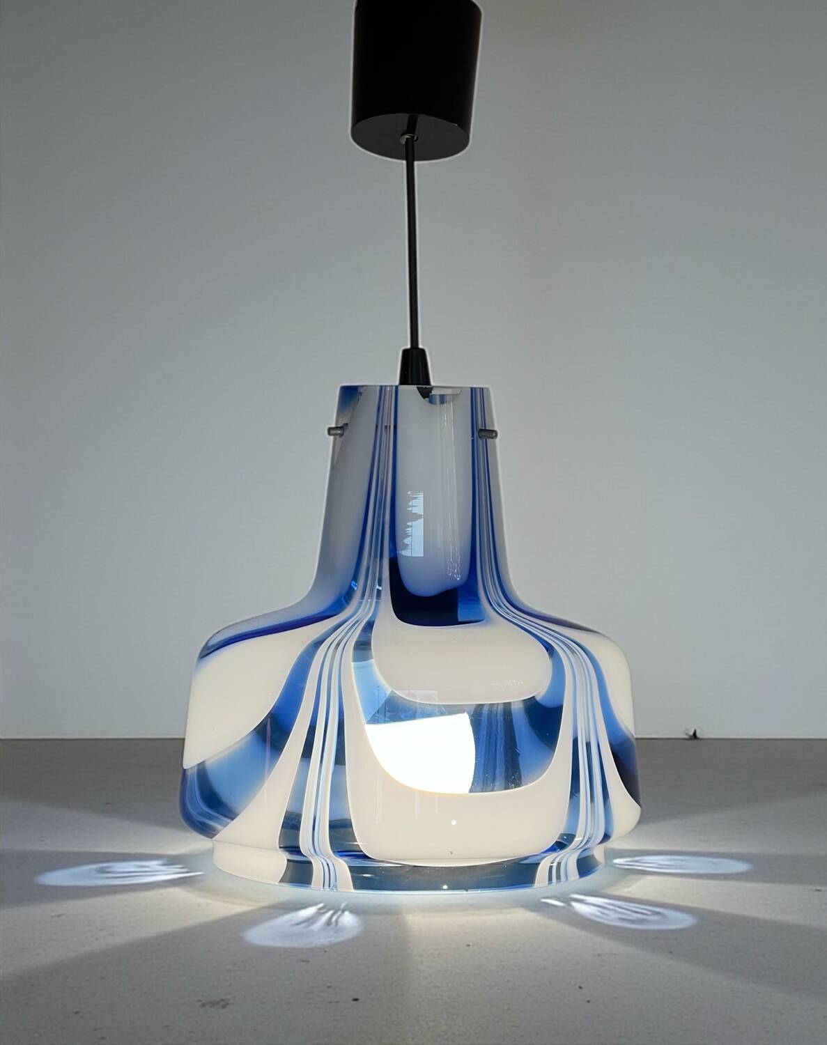 Vintage 1970s Italian Murano suspension light in ribbed glass.