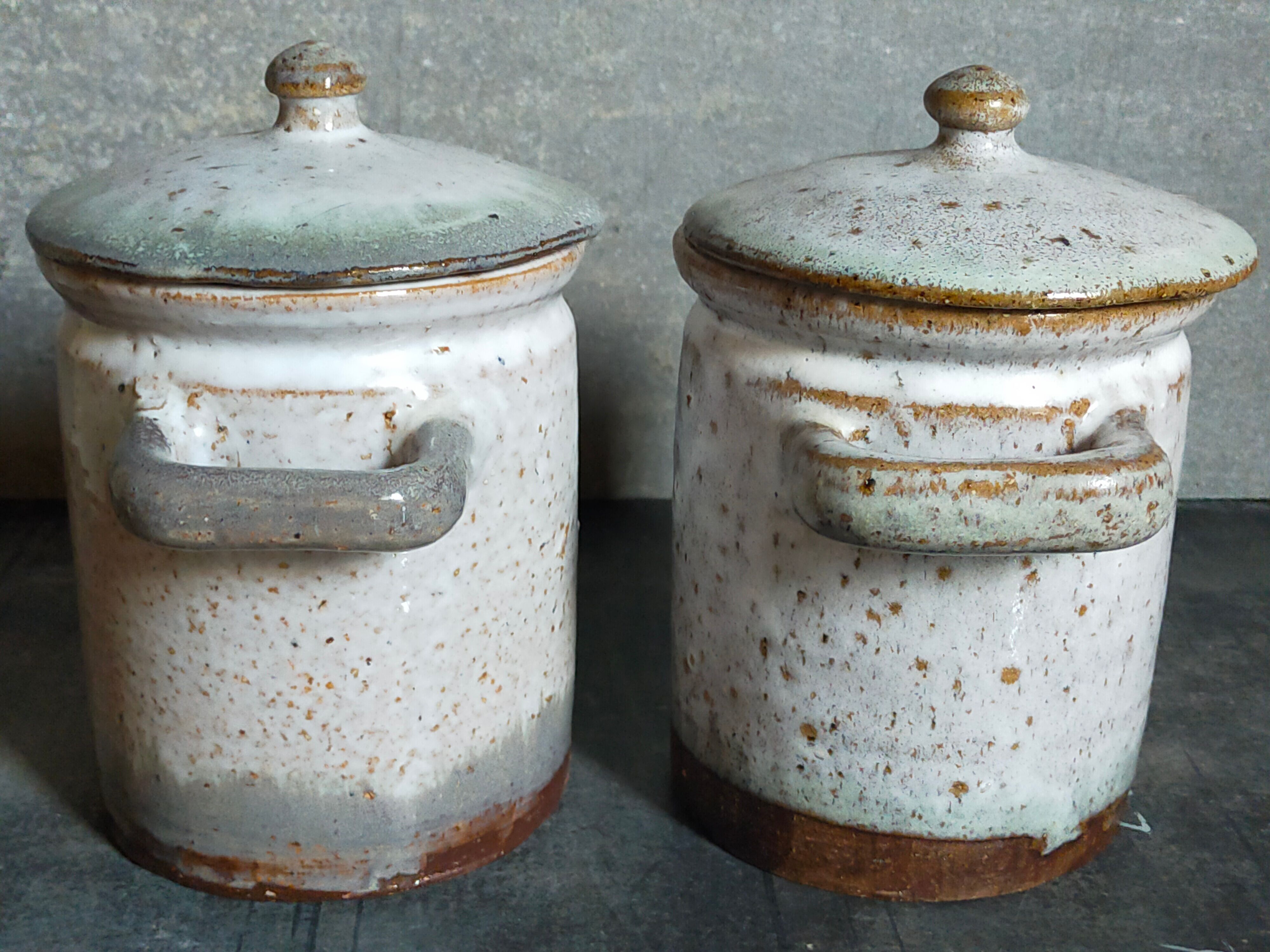 Duo of potter's pots covered in vintage glazed stoneware