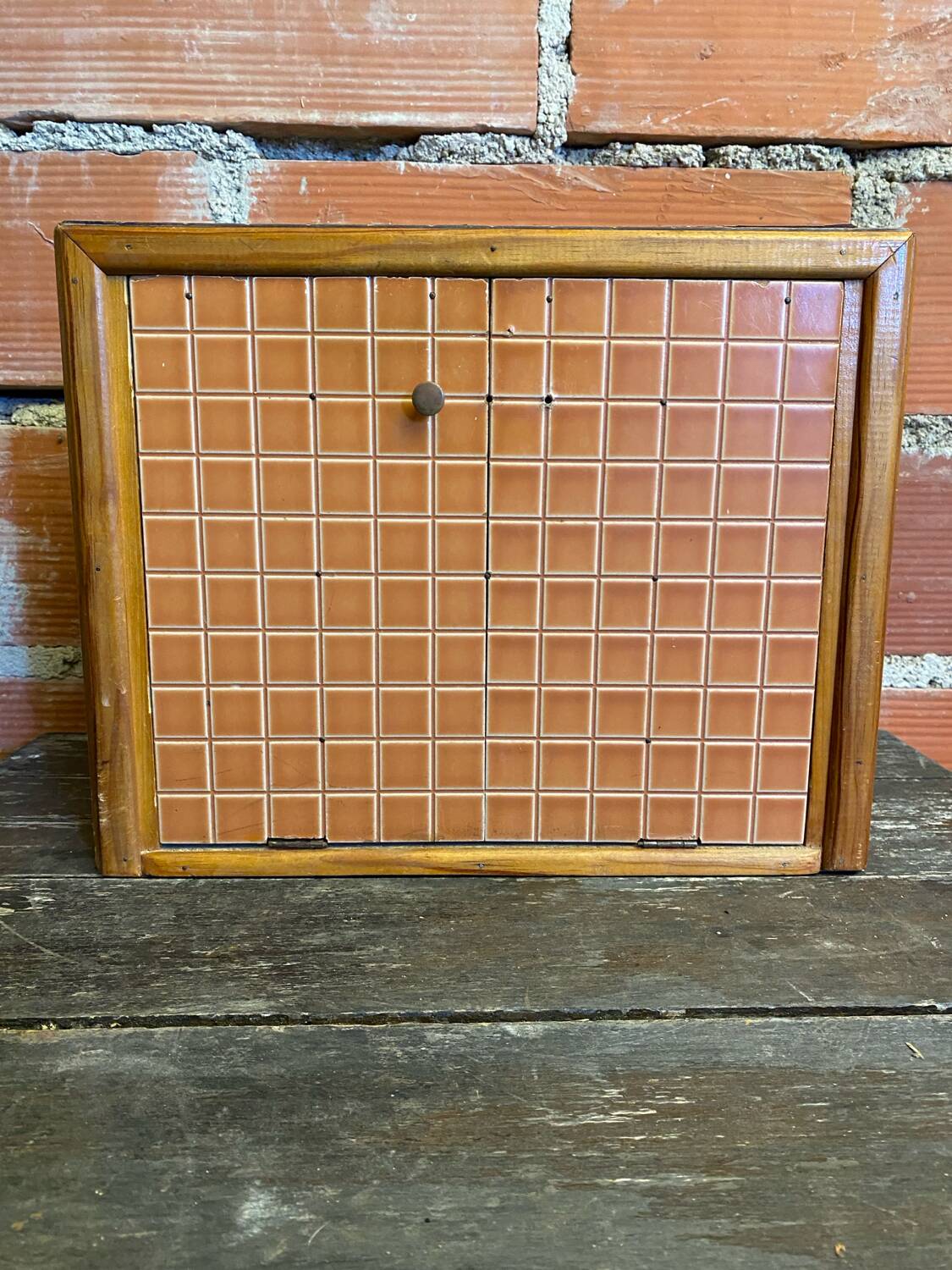 Vintage wooden storage cabinet with shelves