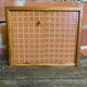 Vintage wooden storage cabinet with shelves