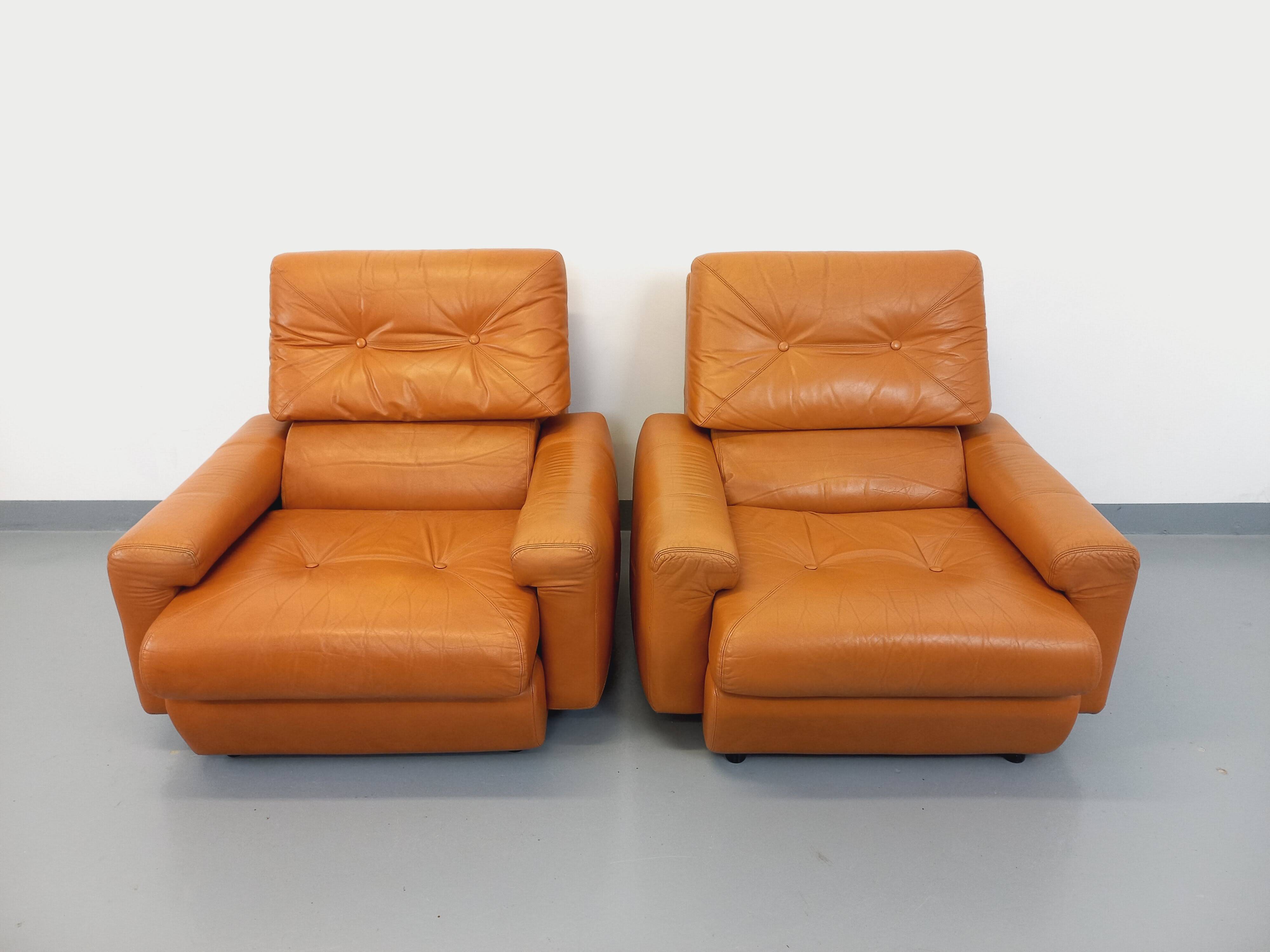 Pair of vintage leather lounge chairs from the 60s and 70s
