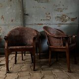 Arm chairs in dark rattan