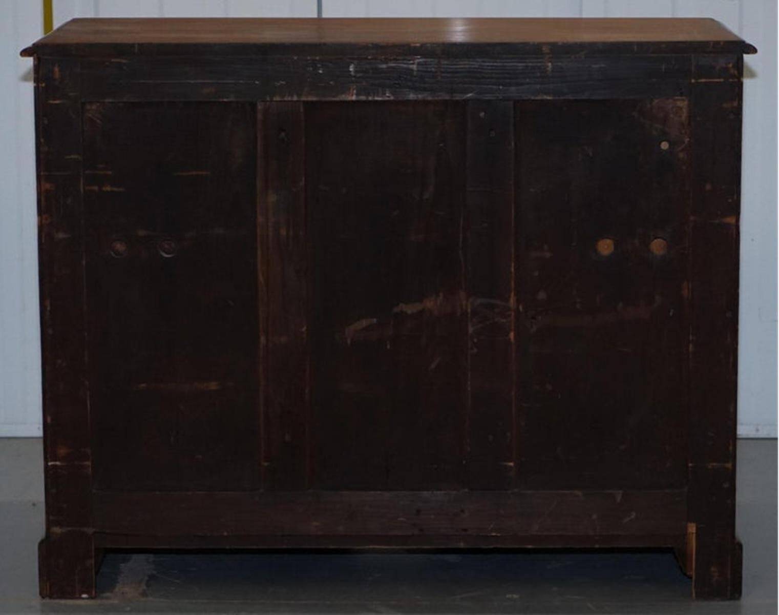 Small Victorian desk in solid walnut with drawers.