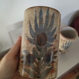 Two vases rolls decorated with thistles, signed
