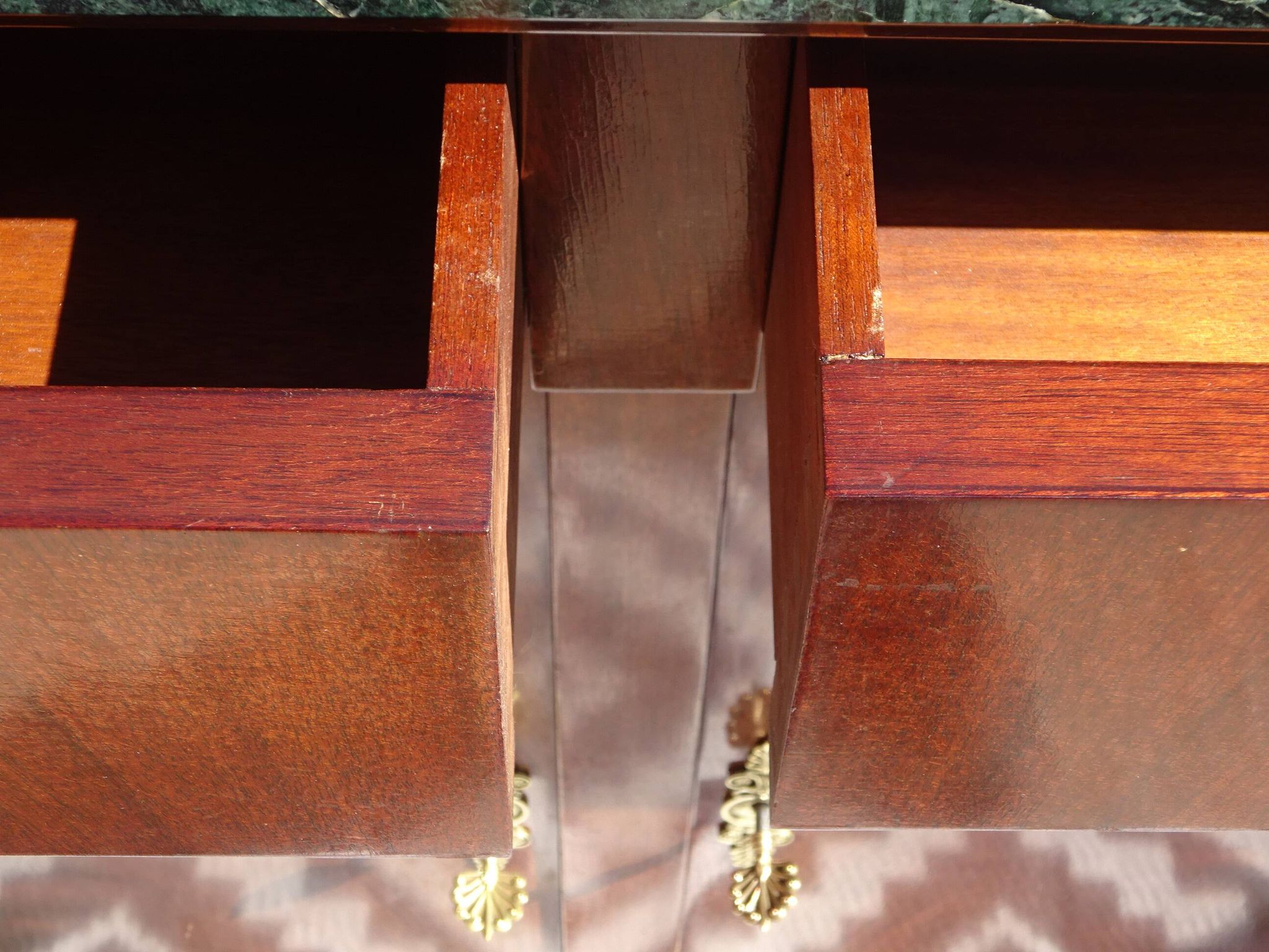 Flamed mahogany enfilade with sea green marble in Empire style.