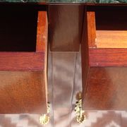Flamed mahogany enfilade with sea green marble in Empire style.
