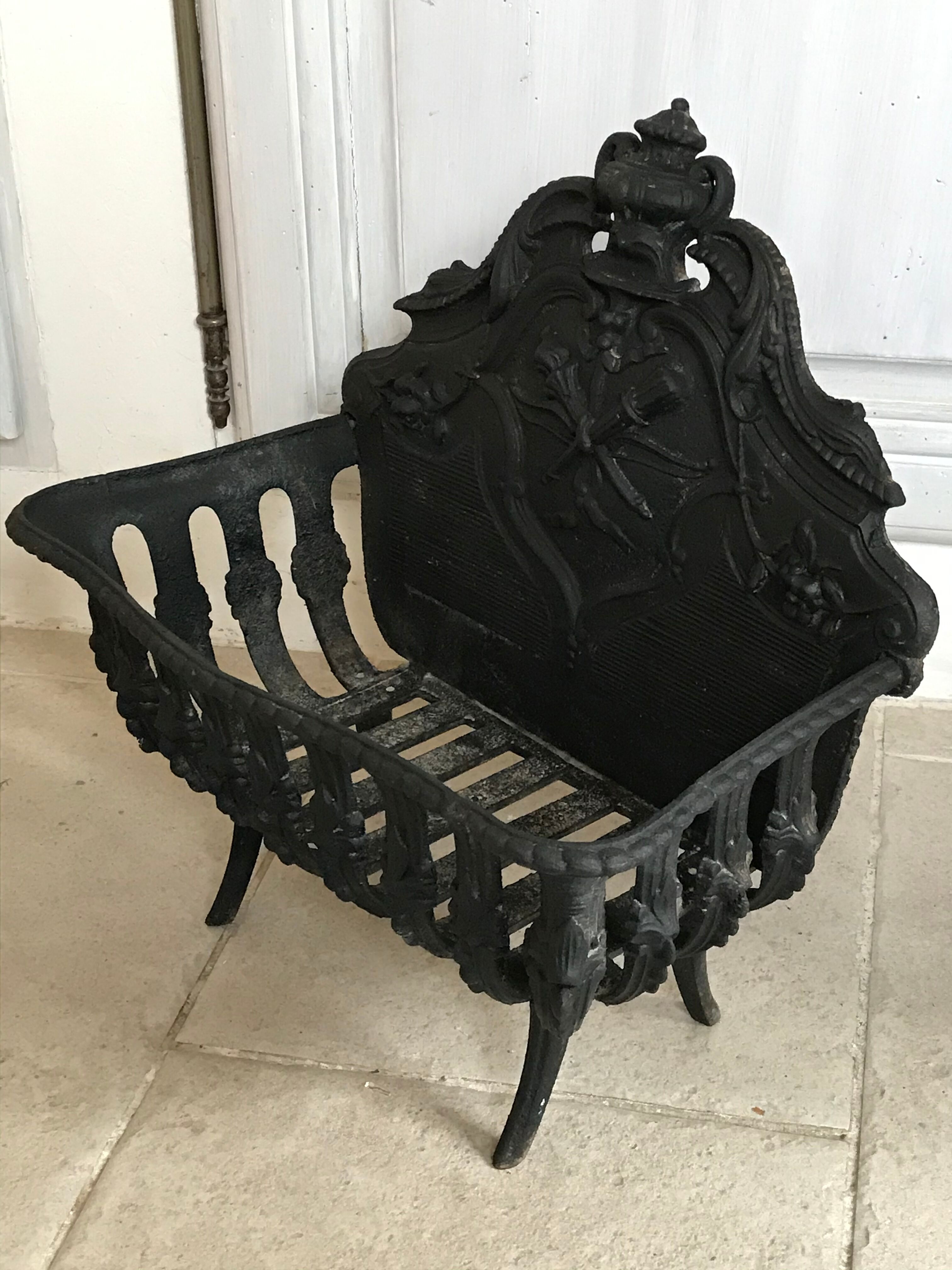 Cast iron fireplace cradle log holder