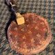 Very old round pocket mirror and leather case, 18th century