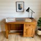 Vintage wooden desk with 1 drawer and 1 door.