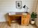Vintage wooden desk with 1 drawer and 1 door.