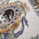 Hand painted gien tile on wrought iron trivet