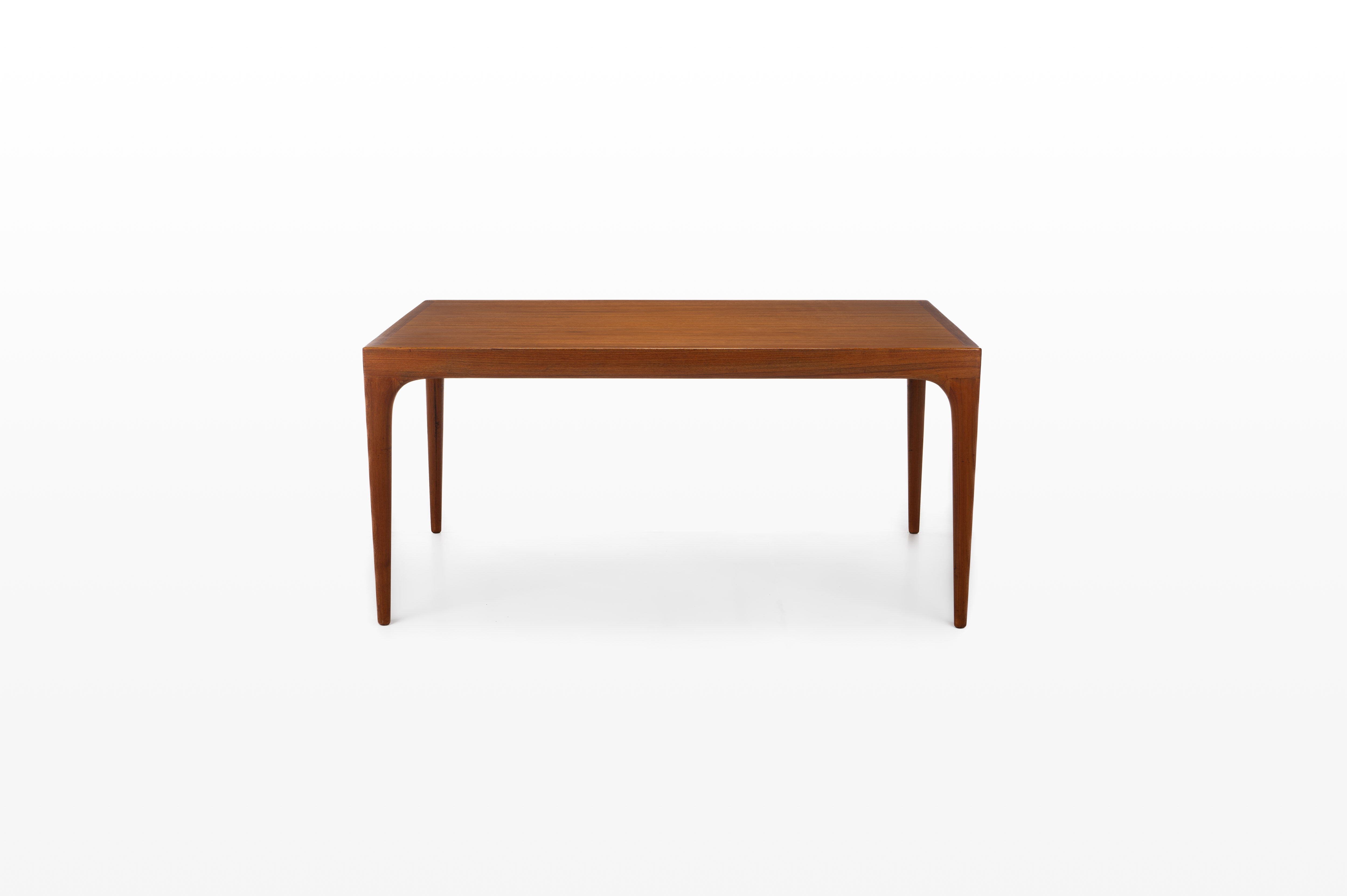 Extendable dining table in teak by Johannes Andersen for Uldum Møbelfabrik