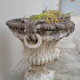 Pair of planter vases decorated with faces in reconstituted stone 1950s