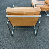 Paire de fauteuils chauffeuses contemporains cuir
