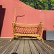 Bamboo and rattan baby cot with canopy.