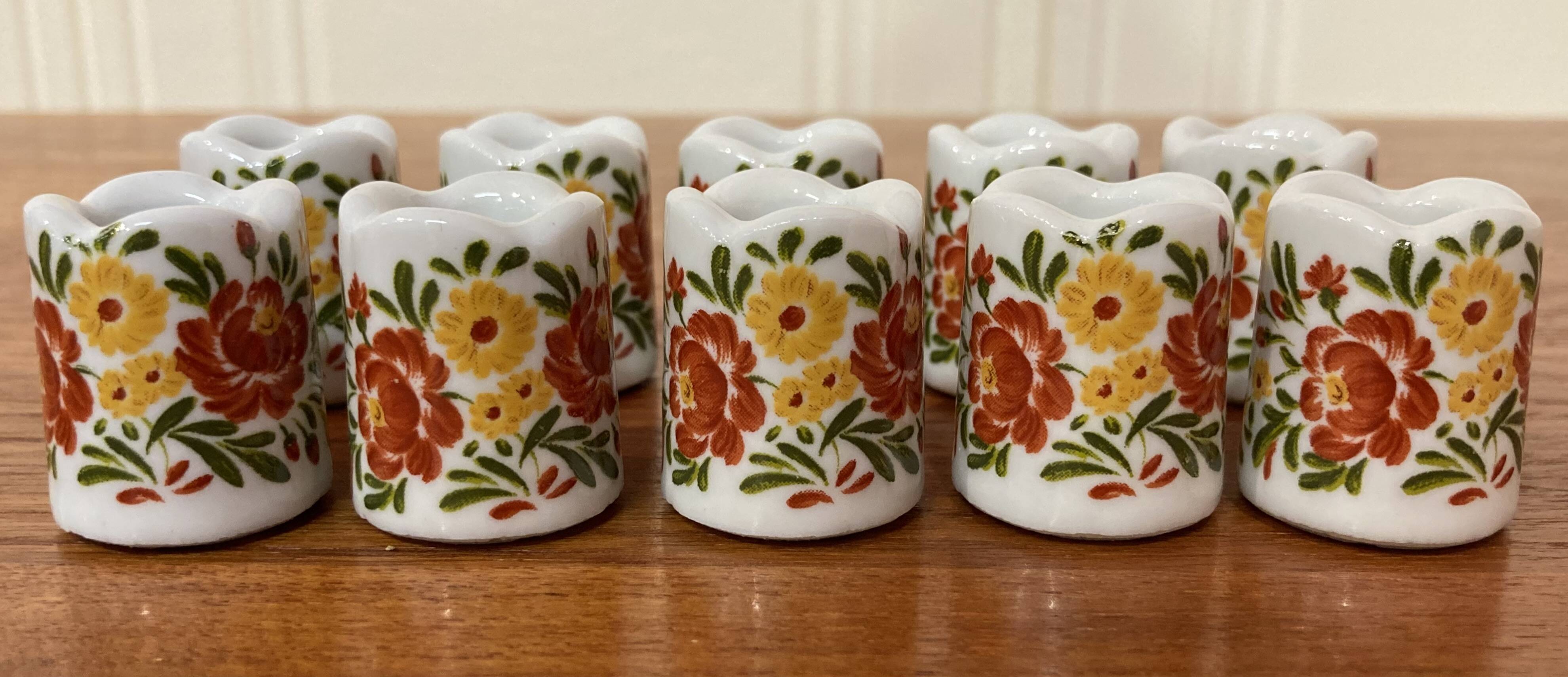 Set of ten 1950s design candle holders.
