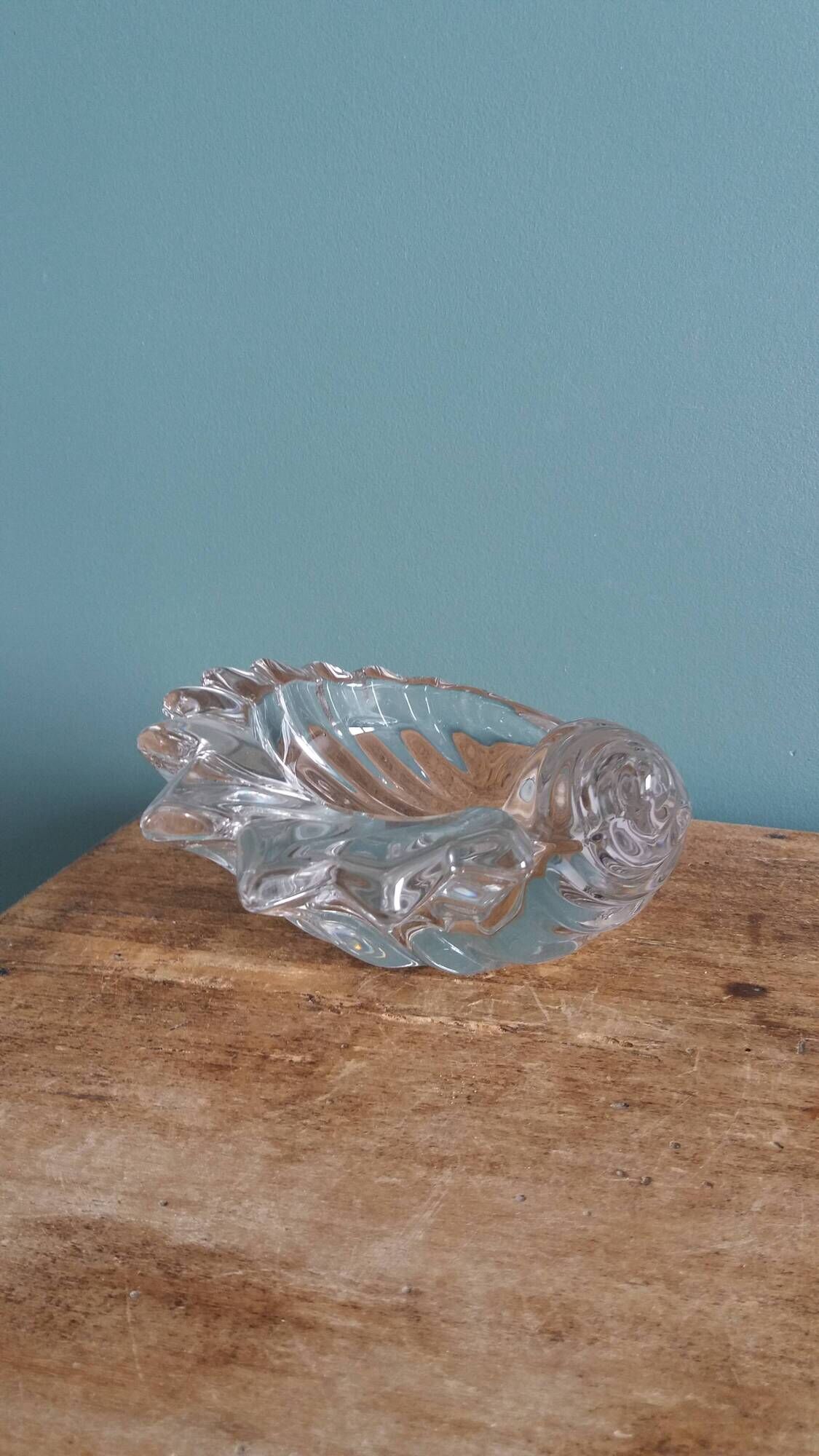 Shell-shaped crystal paperweight.