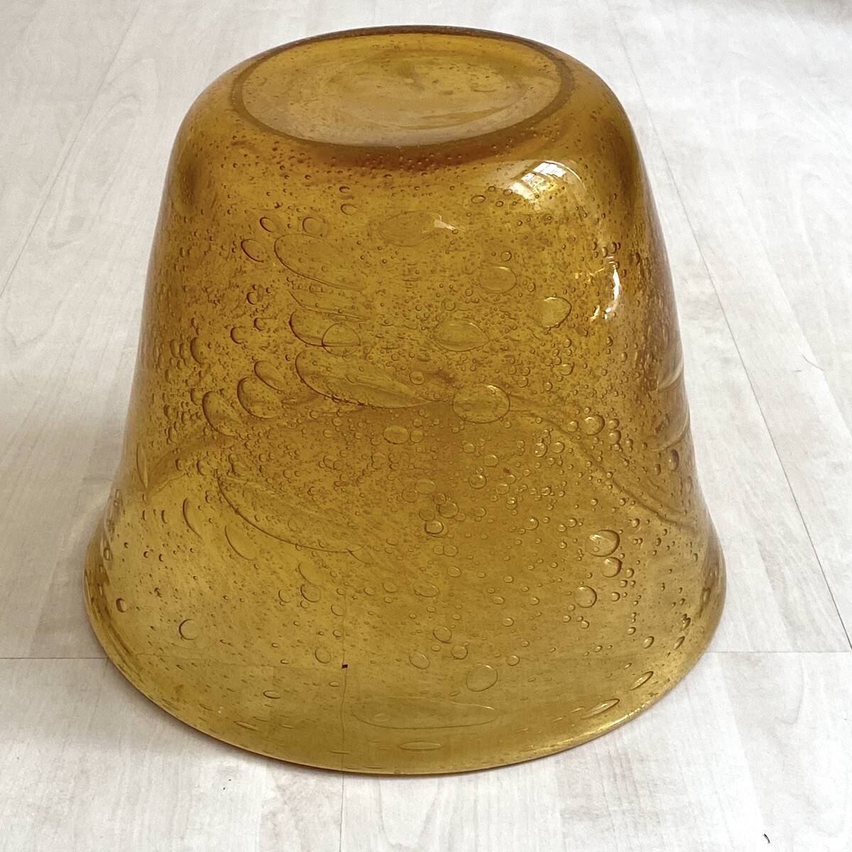 Champagne bucket from the Biot glassworks in ochre-colored blown glass