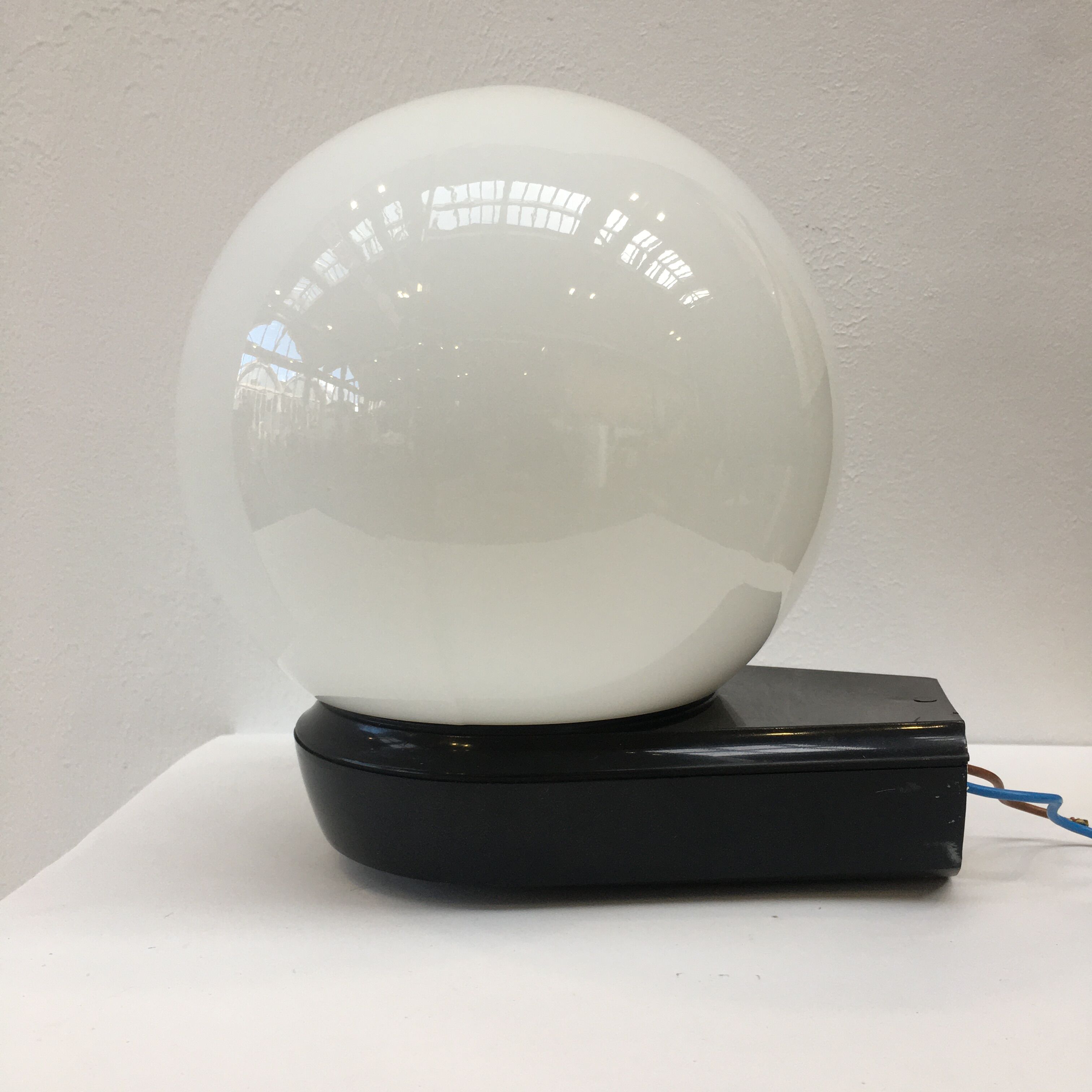 Vintage wall lamp black plastic base and opaline globe