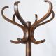 Baumann swivel parrot coat rack, dark wood.