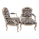 Pair of armchairs, carved and polychrome wood, printed zebra tapestry, Louis XV, circa 1790 – France