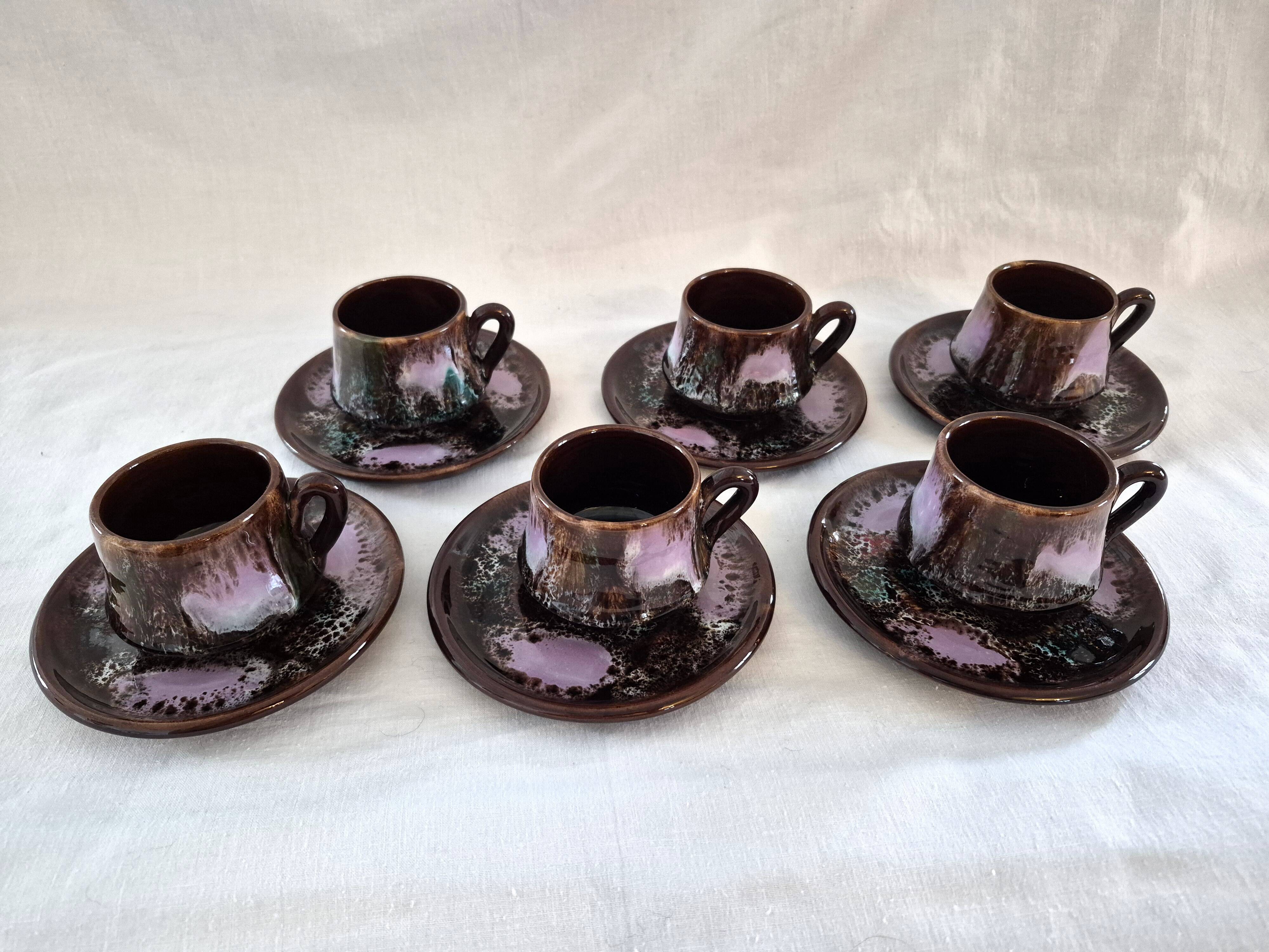 Six cups and saucers Vallauris glazed ceramic in brown and old pink.