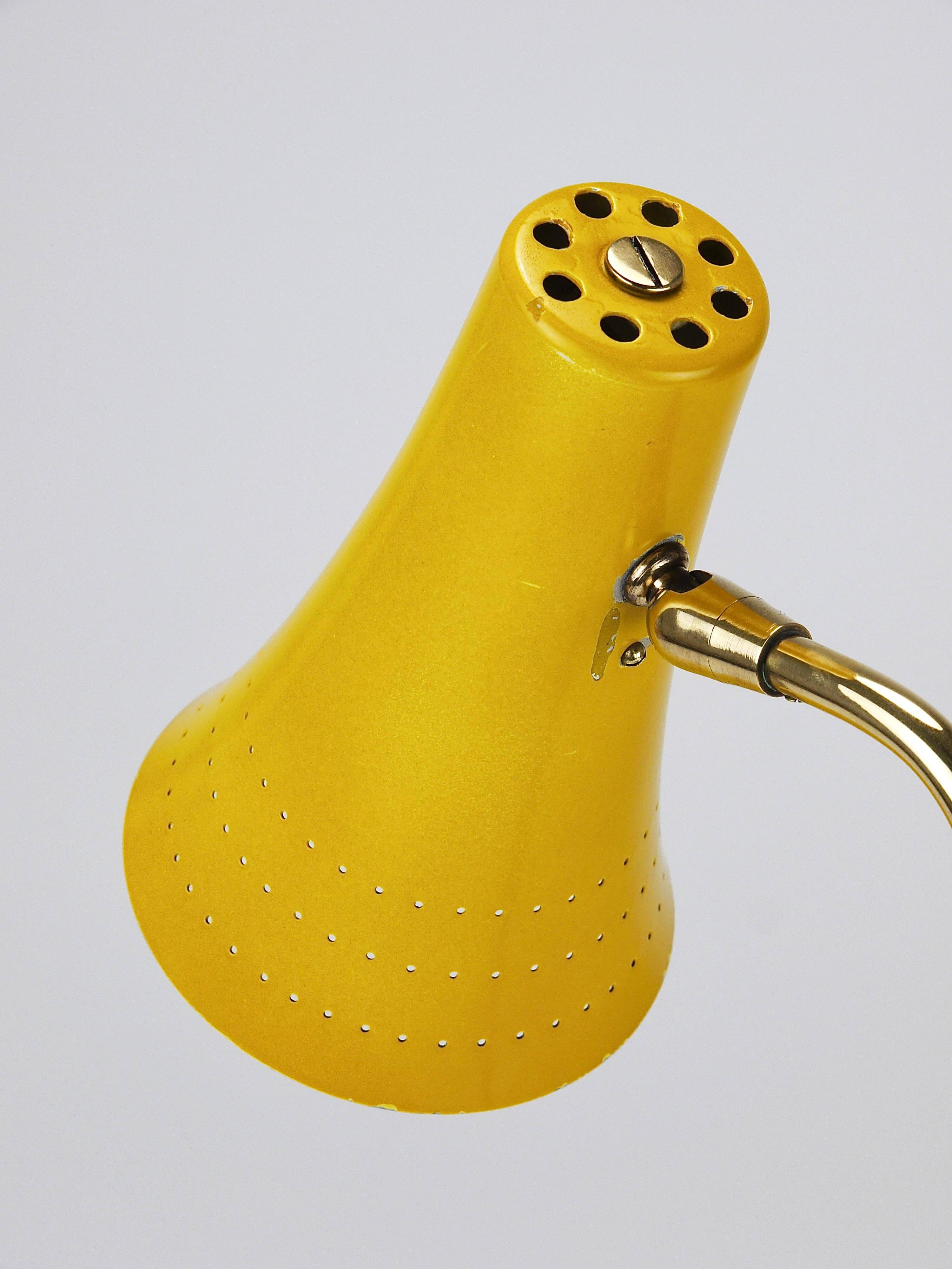 Yellow desk, table or accent lamp by J.T. Kalmar, brass and iron, Vienna, Austria, 1950s.