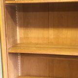 Old school glass bookcase in blond wood