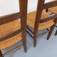 Set of 4 vintage brutalist chairs in wood and straw from the 1960s.