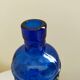 cobalt blue molded glass bottle in relief decoration bunches of grapes