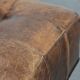 Beautiful sheepskin ottoman on high legs and beautiful warm colours