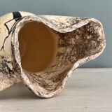 Enamelled ceramic pitcher with rock decoration