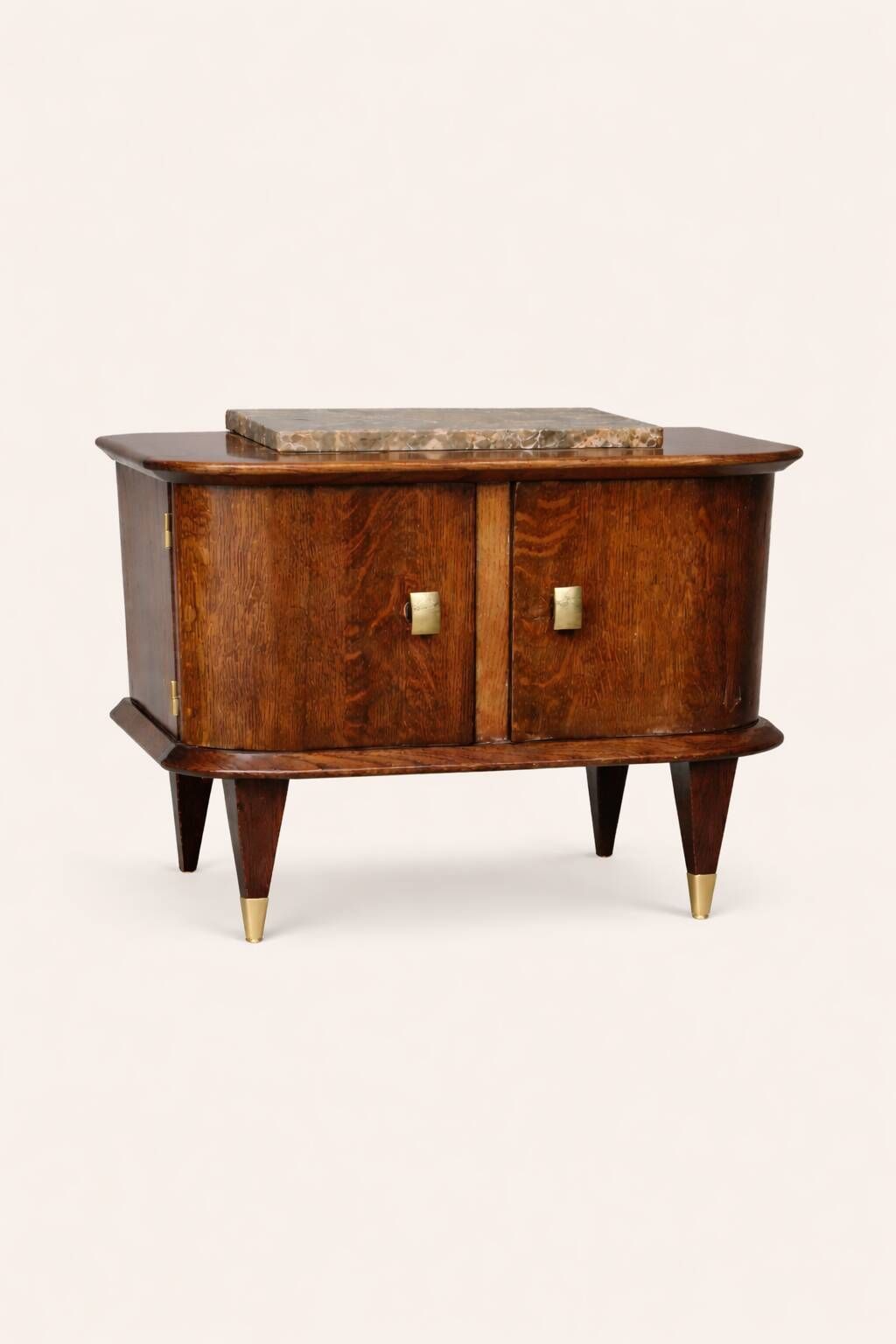 Small vintage 1950s wooden buffet with marble top and tapered legs.