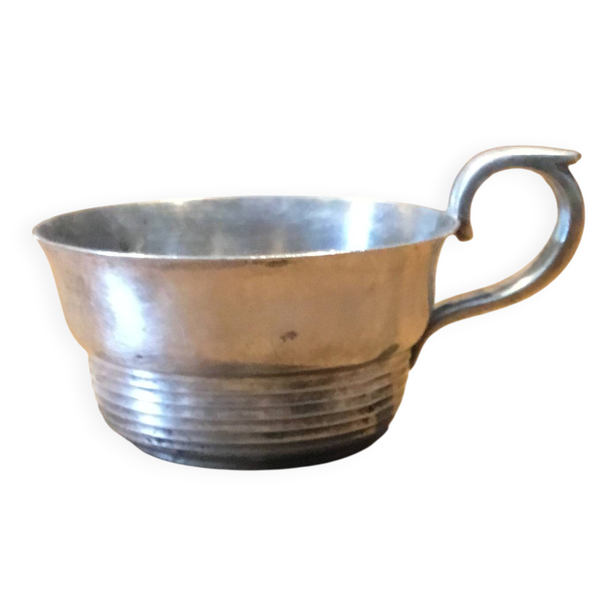 petite tasse en métal argenté