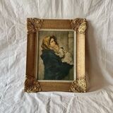 Old wall frame in carved gilded wood