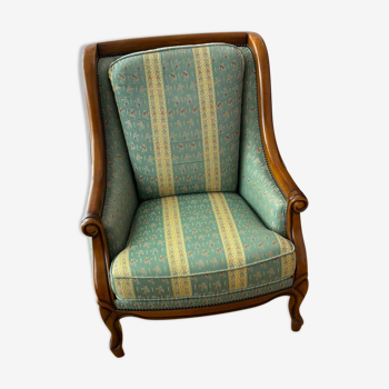 Green fabric armchair