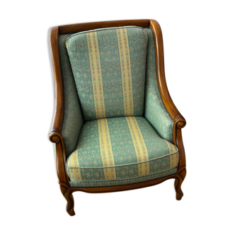 Fauteuil en tissu vert