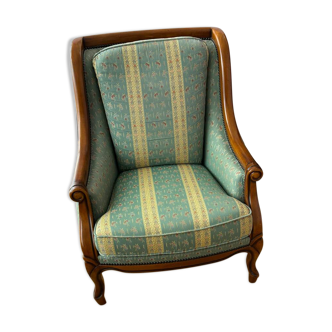 Green fabric armchair