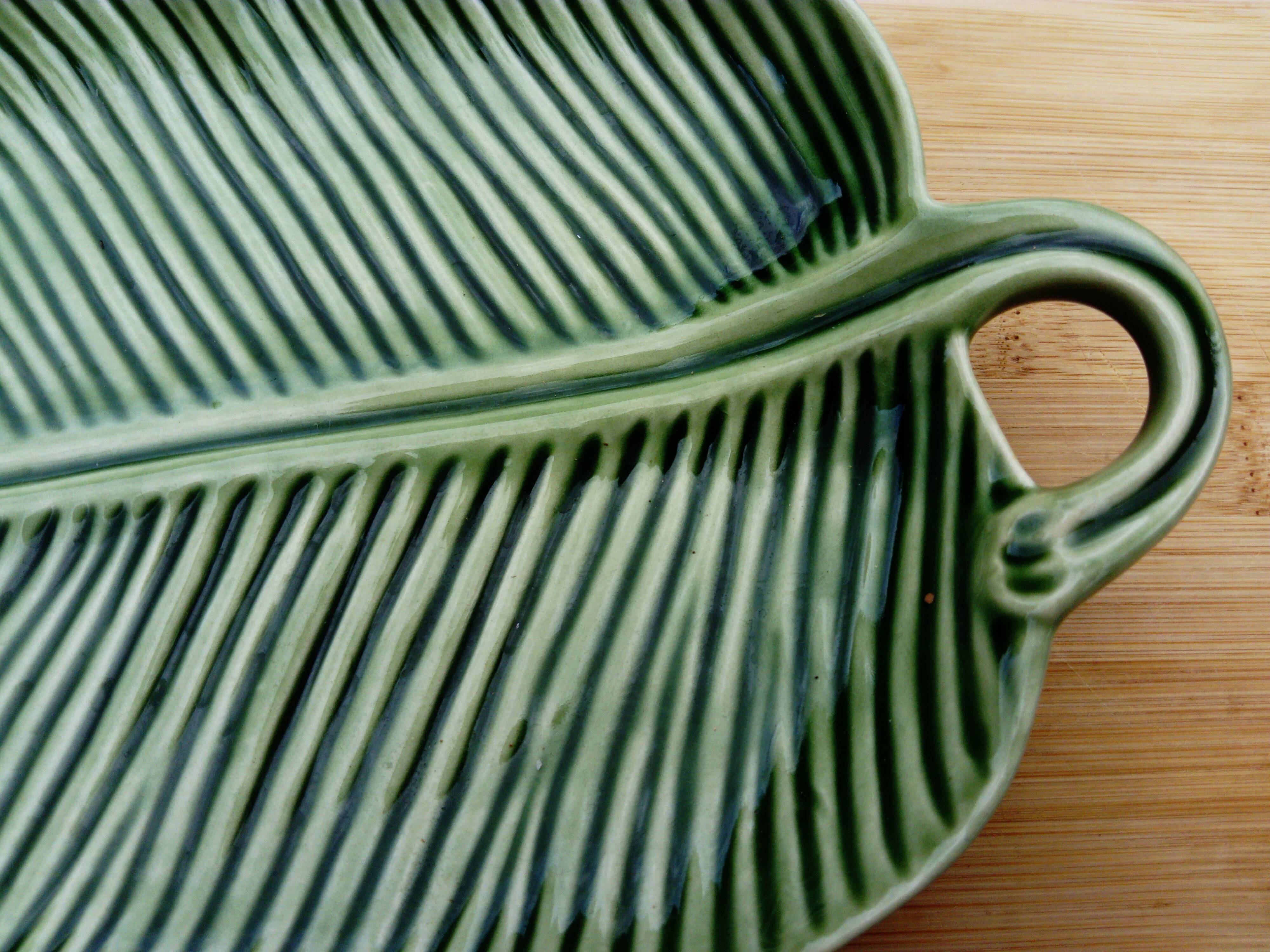 Slip dish in the shape of a palm leaf