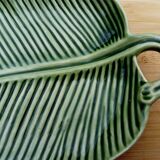 Slip dish in the shape of a palm leaf