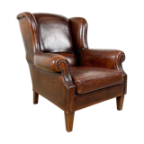 Vintage dark brown sheep leather wingback armchair
