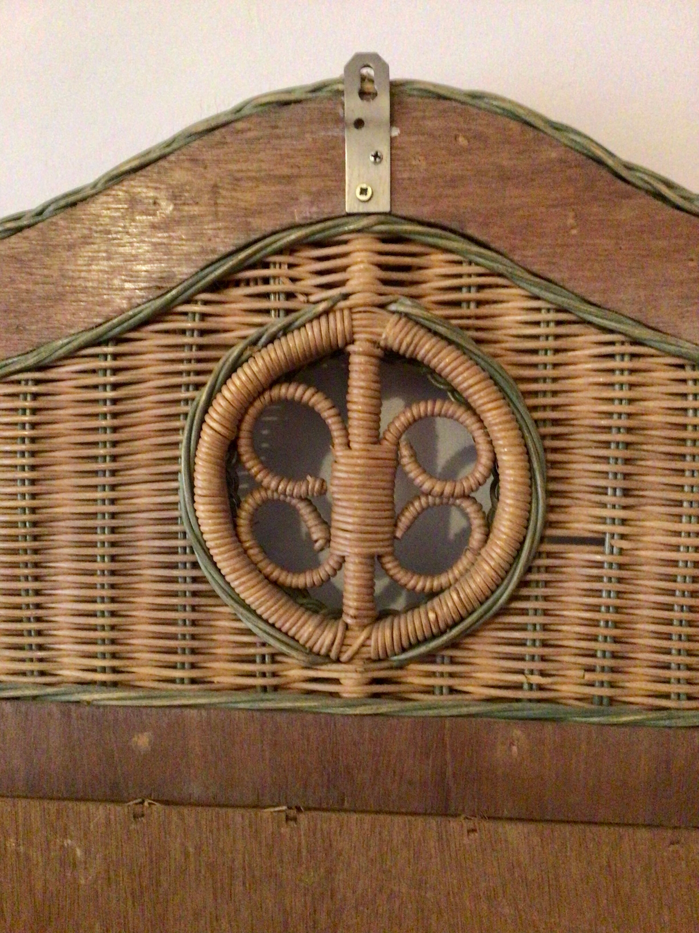 Vintage braided rattan mirror.