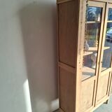 Large antique display cabinet in patinated solid oak.