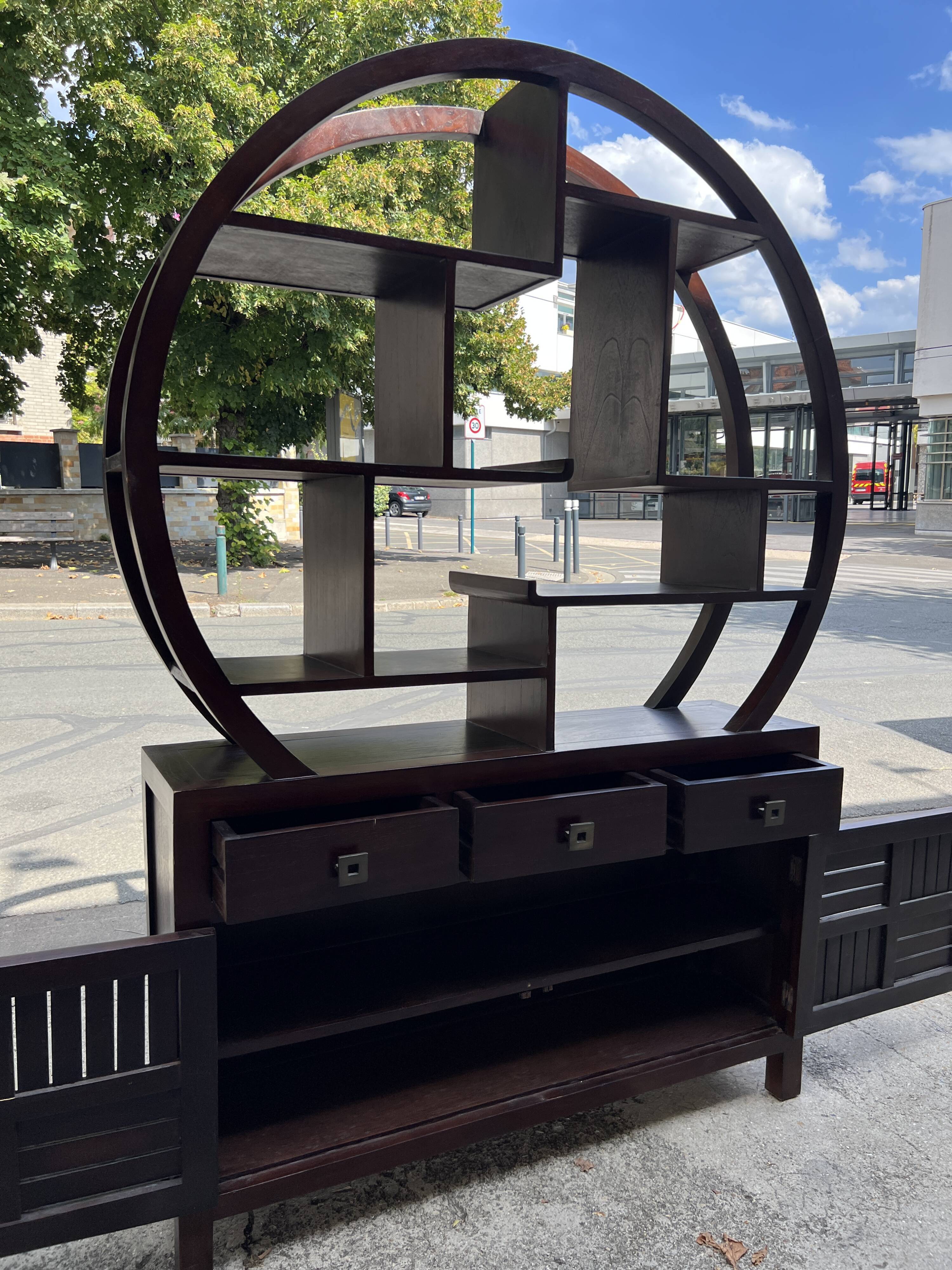 Round galay shelf on bahut sideboard