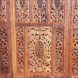 Carved solid wood screen.