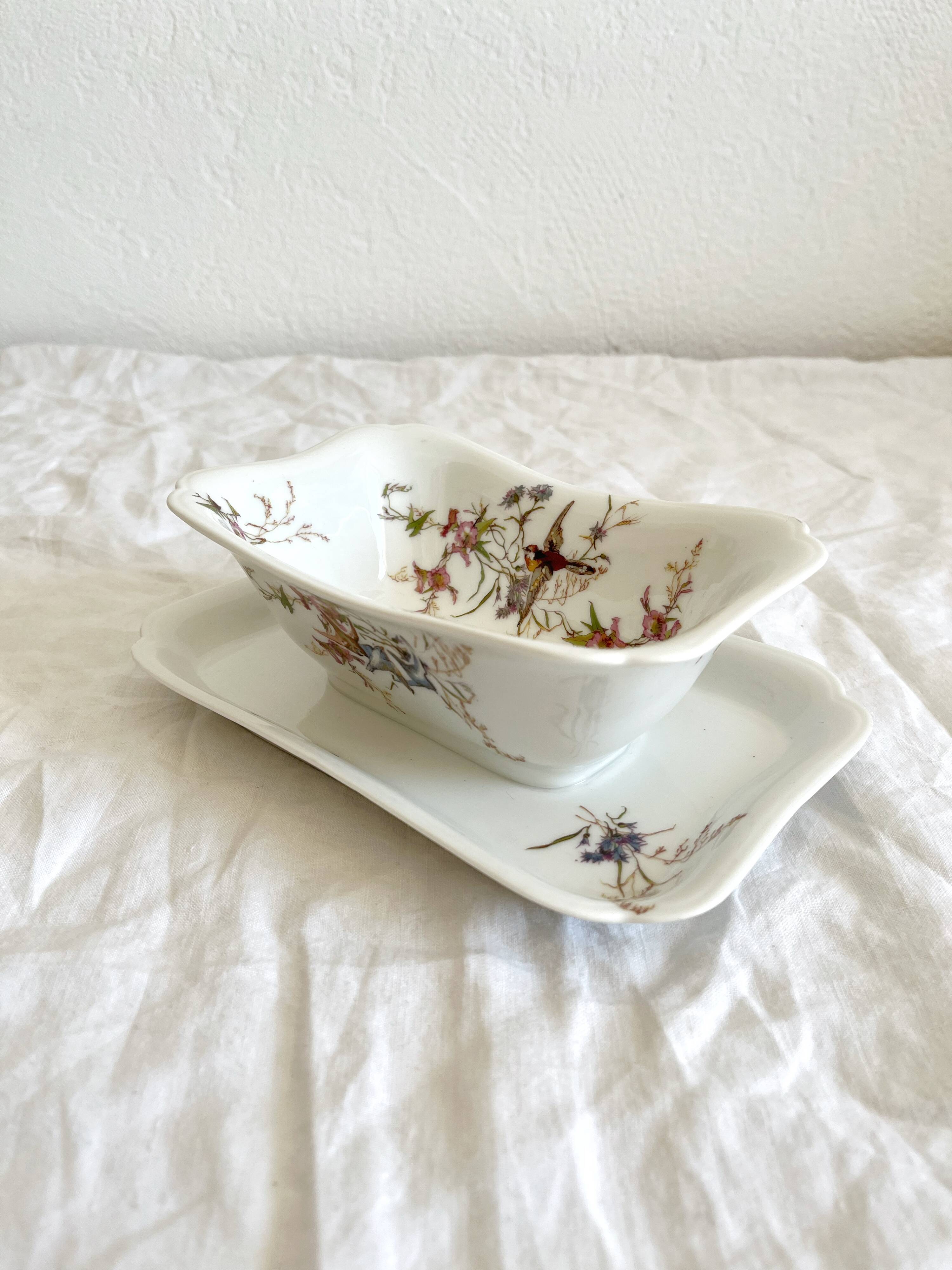 Rectangular sauce boat in Haviland Limoges porcelain with bird decoration