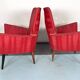 Mid-century modern pair of red armchairs. italy 1950s