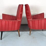 Mid-century modern pair of red armchairs. italy 1950s