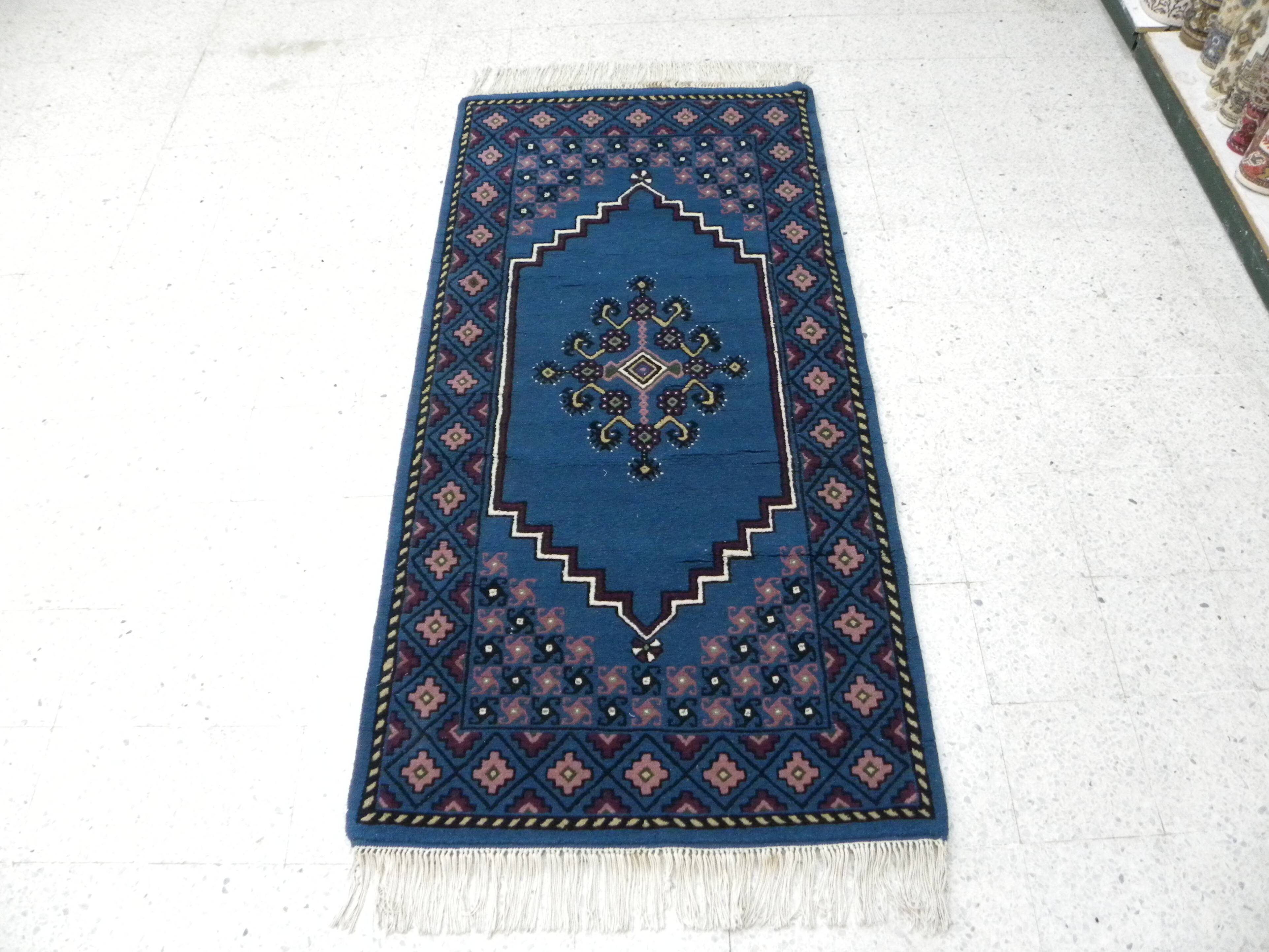 Vintage traditional Tunisian oriental rug in handmade blue wool.