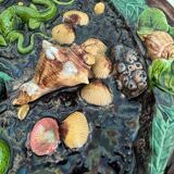 Plat en barbotine décor de coquillages et de lézard Palissy